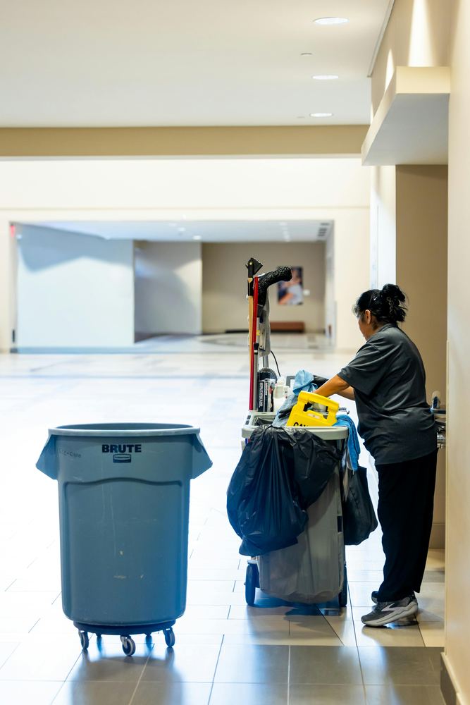 Commercial cleaning cart in a clean hallway