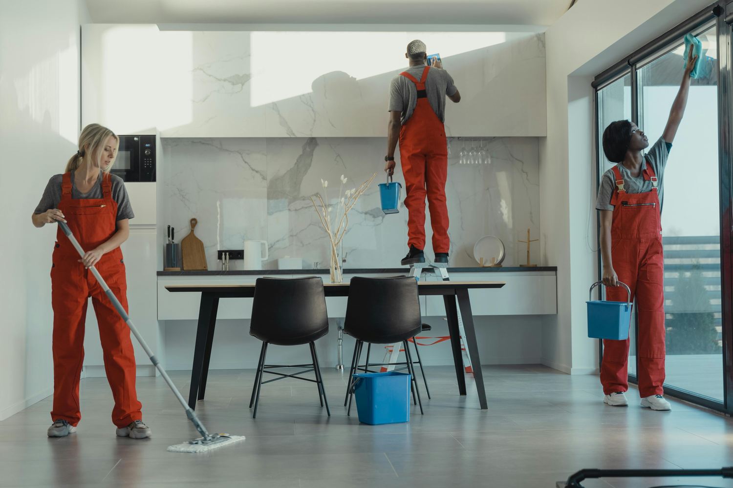 Professional cleaning team working inside a modern property